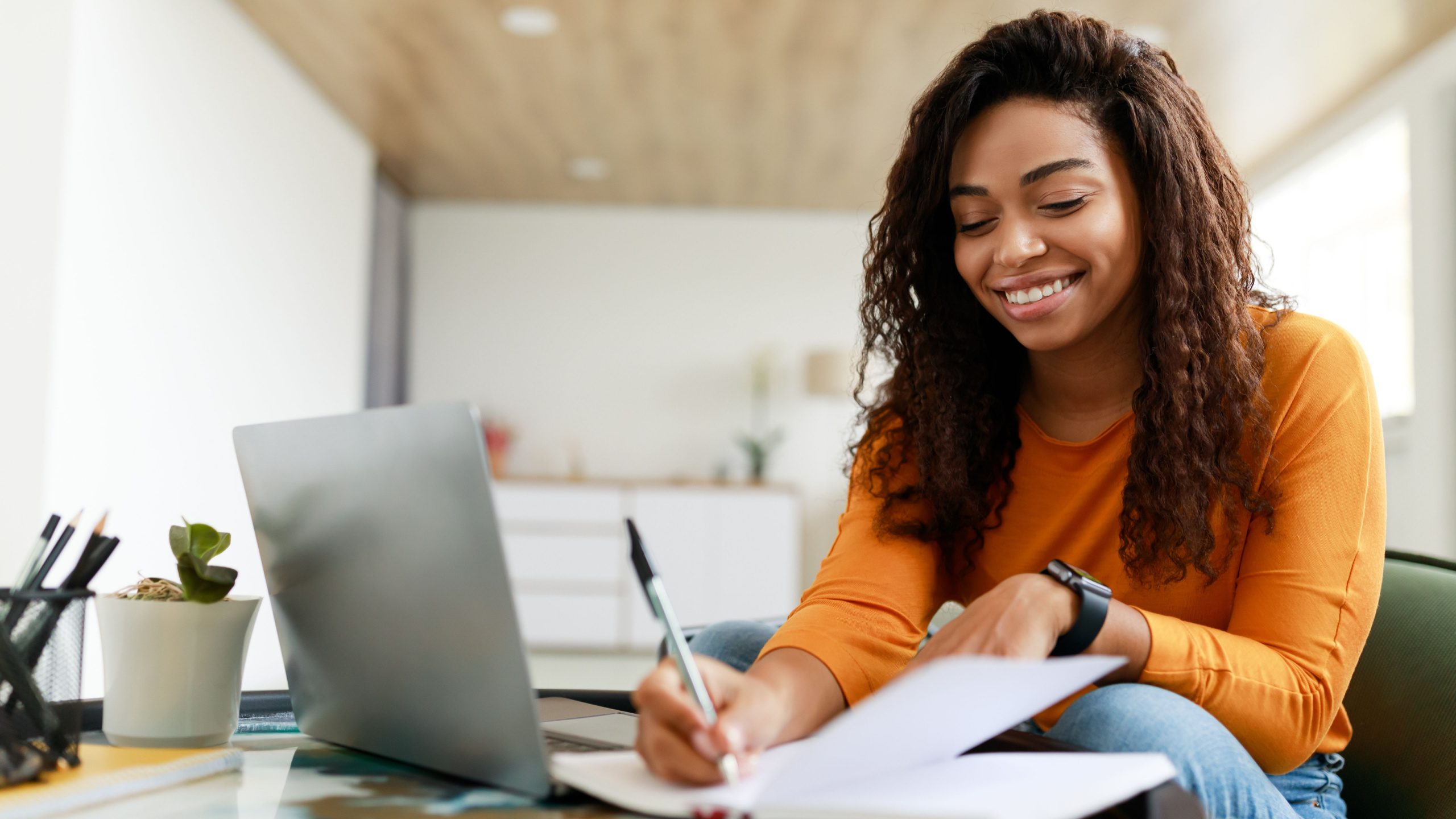 Student studying for USMLE exam in front of her laptop.